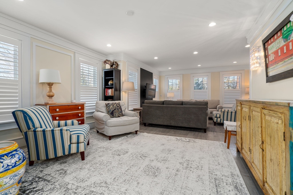 1404 Centre Street Newton, MA 02459 - Photo 11 of 42 a living room with furniture and a large window