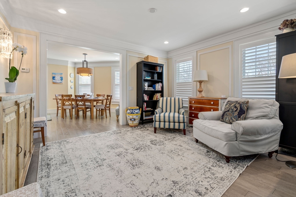 1404 Centre Street Newton, MA 02459 - Photo 13 of 42 a living room with furniture and wooden floor