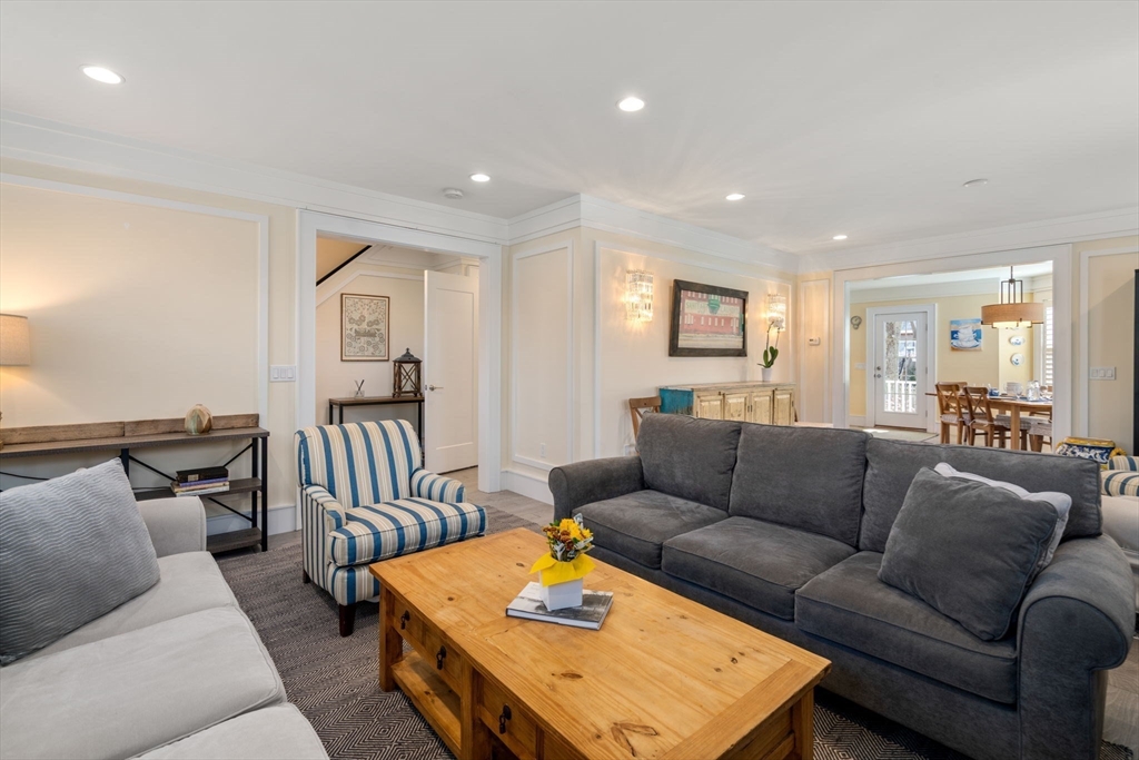 1404 Centre Street Newton, MA 02459 - Photo 16 of 42 a living room with furniture and a wooden floor