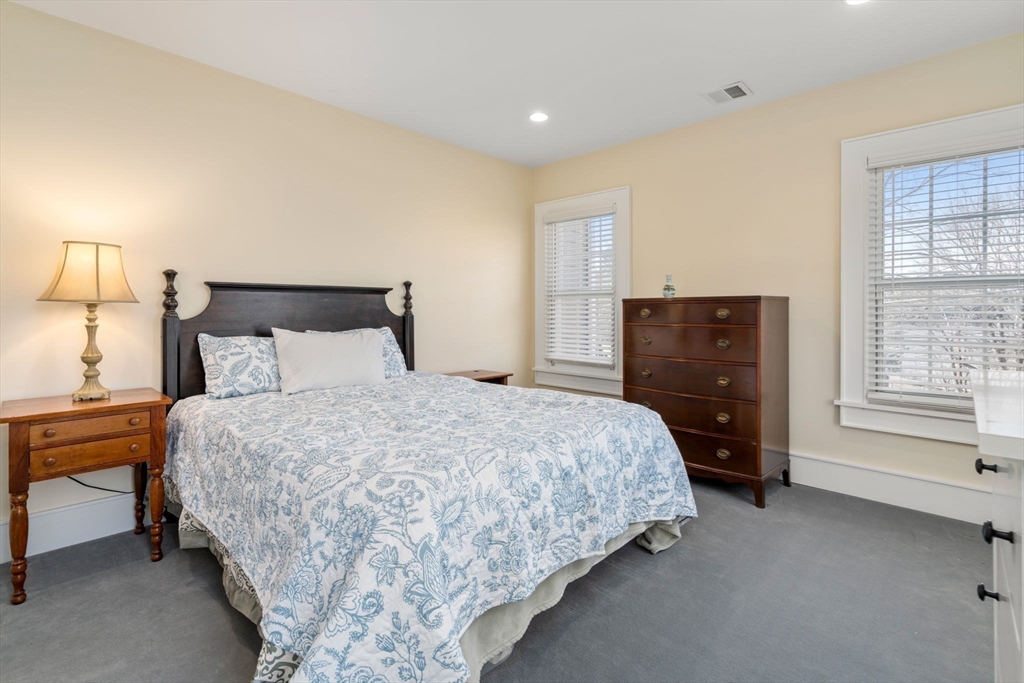 1404 Centre Street Newton, MA 02459 - Photo 24 of 42 a bedroom with a bed and a window