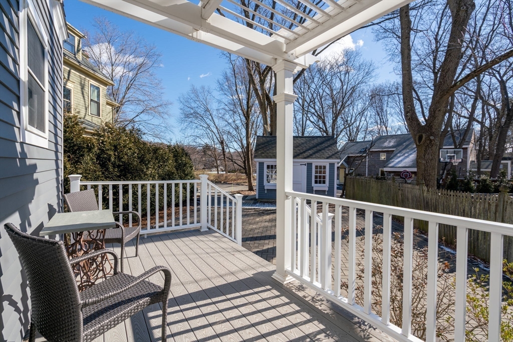 1404 Centre Street Newton, MA 02459 - Photo 34 of 42 a view of a chair and tables