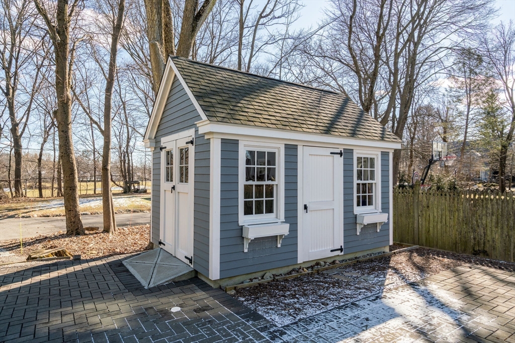 1404 Centre Street Newton, MA 02459 - Photo 35 of 42 a view of a house with a yard