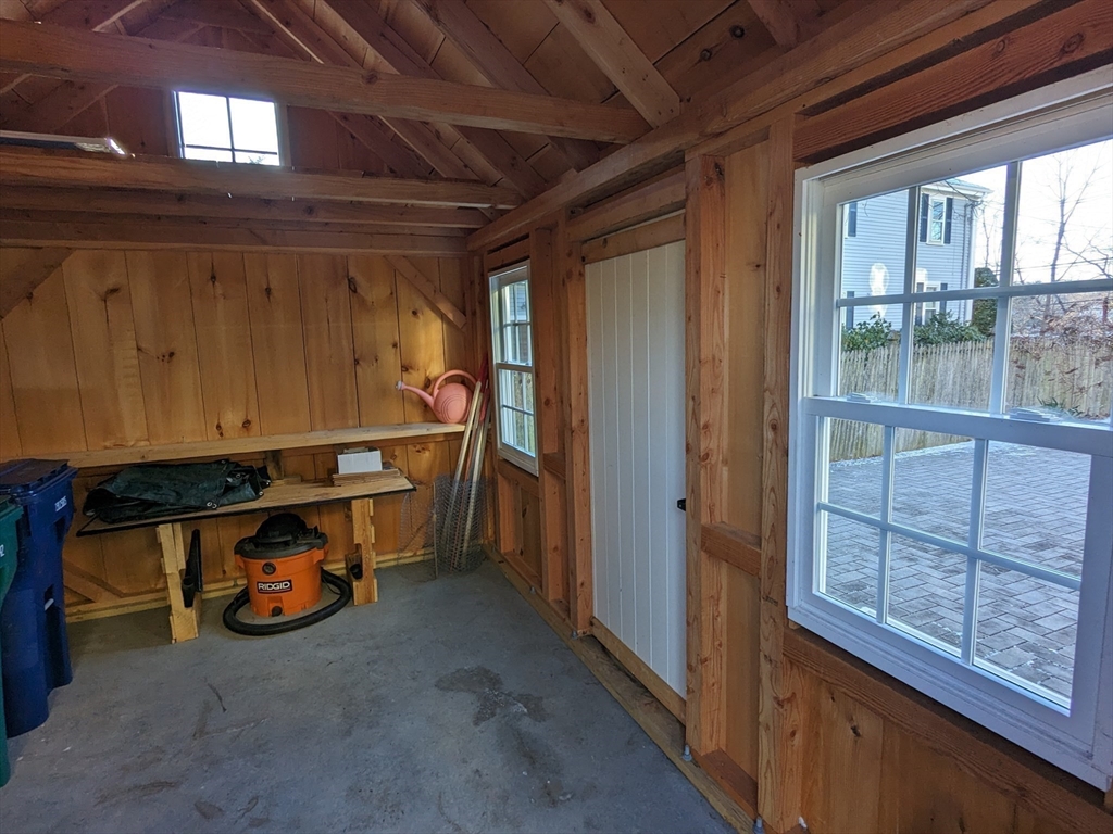 1404 Centre Street Newton, MA 02459 - Photo 36 of 42 a room with wooden walls and furniture
