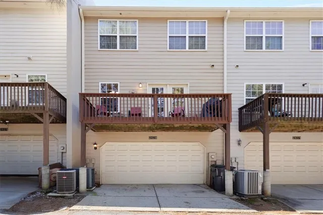 an aerial view of a house with a lake view
