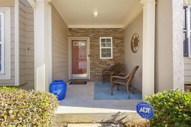 a living room with a couch and a table