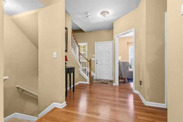 a view of entryway with wooden floor