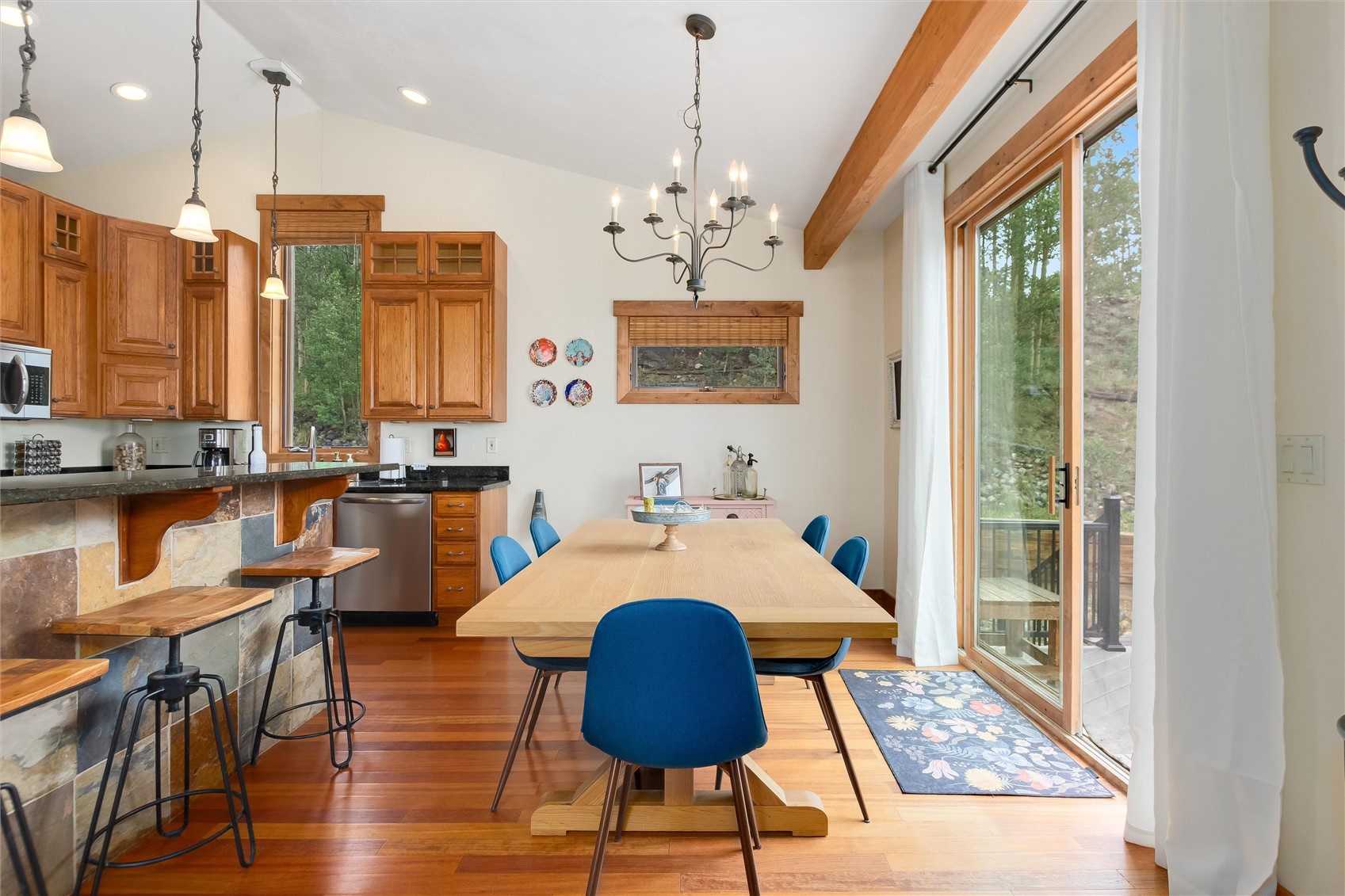 592 Ponderosa Road Fairplay, CO 80440 - Photo 13 of 45 a large kitchen with a table and chairs