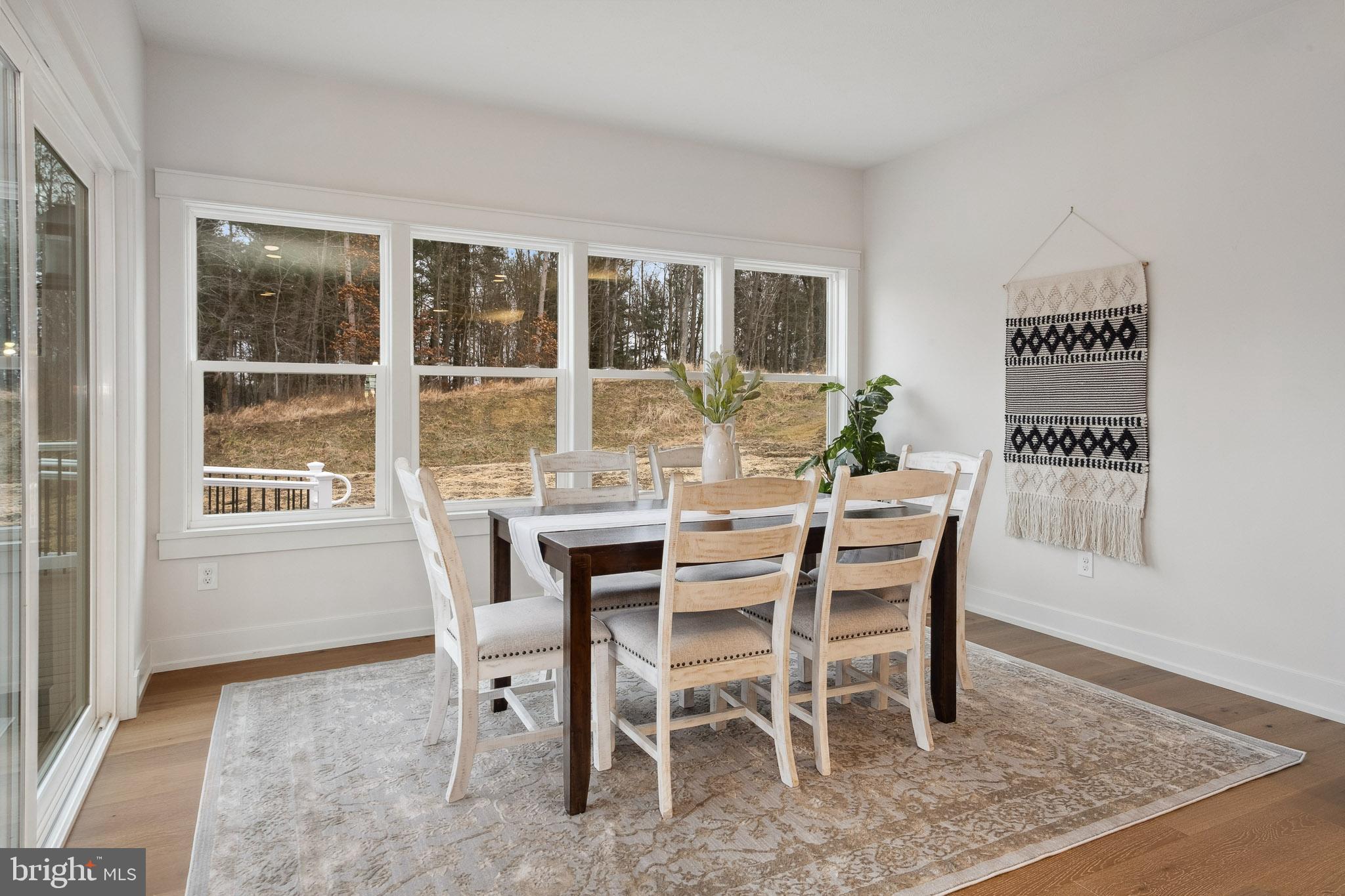 510 Newcomen Road, Unit M1D Exton, PA 19341 - Photo 19 of 34 a dining room with furniture and window