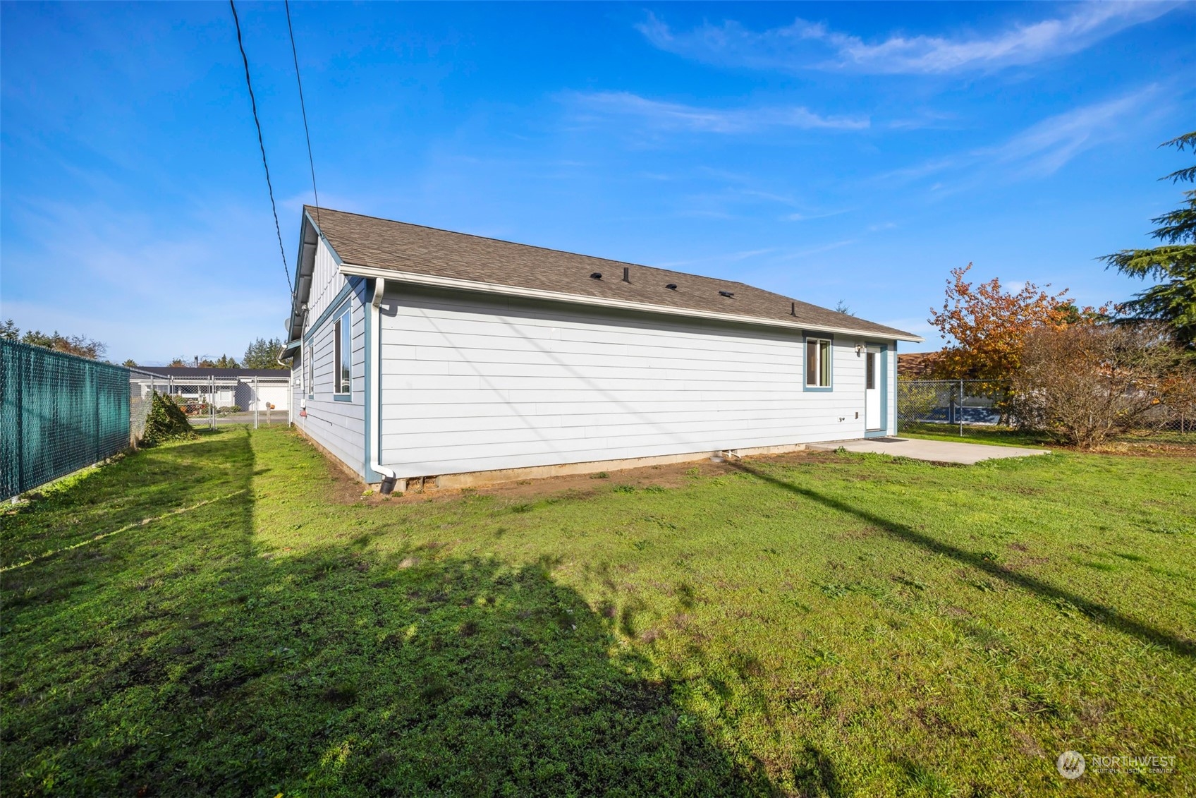 709 East Fir Street Sequim, WA 98382 - Photo 26 of 29 a view of backyard of house and car parked