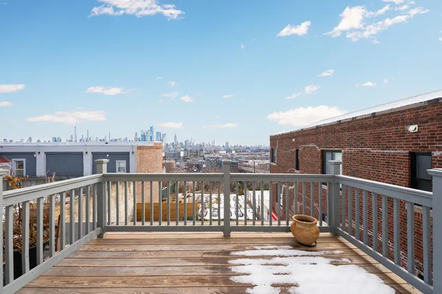 a view of a hallway with entryway