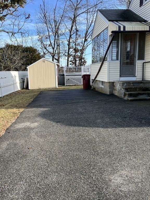 39 Phebe Avenue Lowell, MA 01854 - Photo 4 of 13 a view of a house with a yard