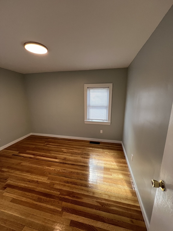 39 Phebe Avenue Lowell, MA 01854 - Photo 10 of 13 a view of empty room with window