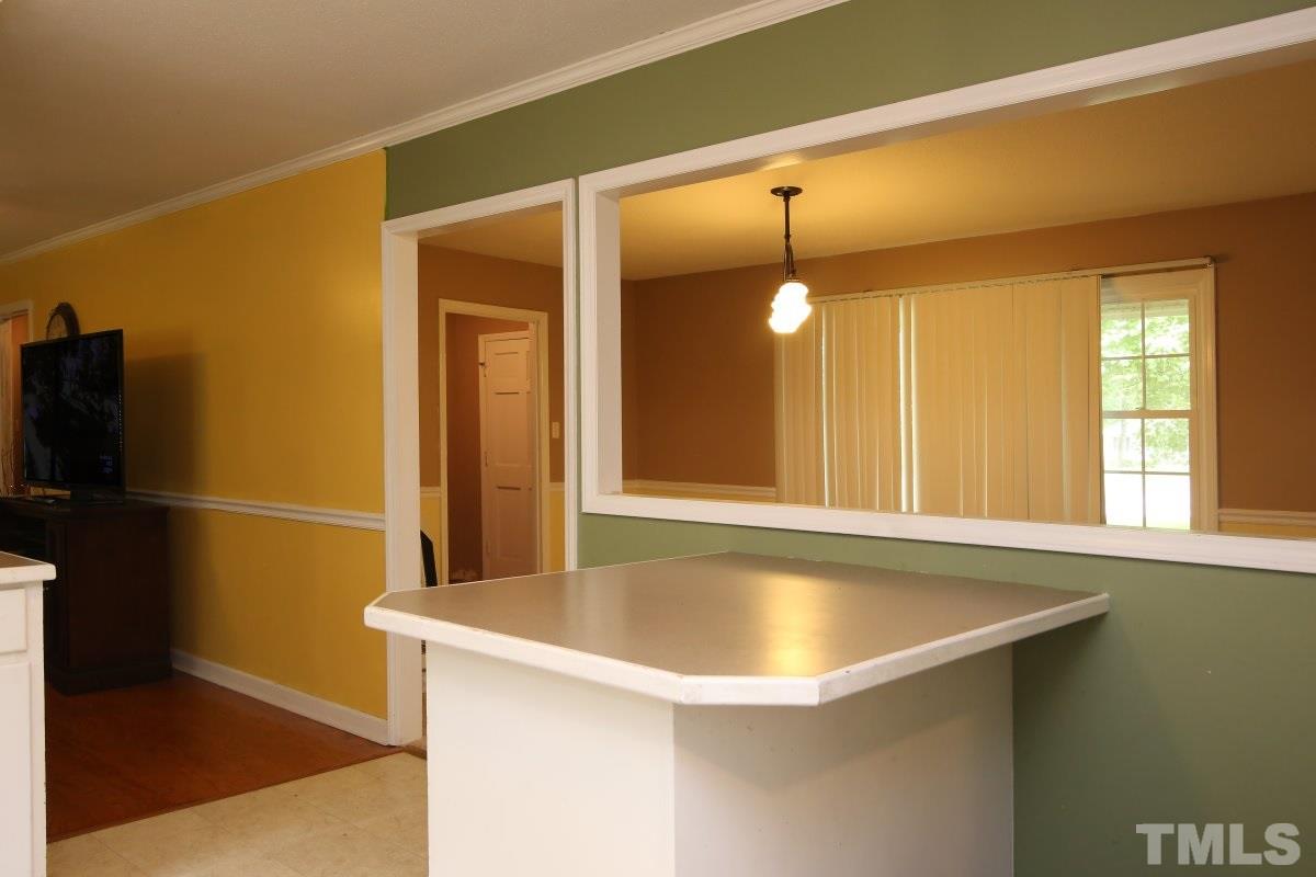 1629 Gate 2 Road Creedmoor, NC 27522 - Photo 3 of 22 a bathroom with a tub and a shower