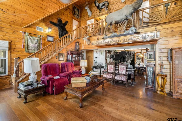 a view of a chairs and tables in the patio