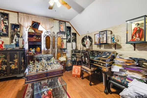 a city room with lots of furniture and clutter