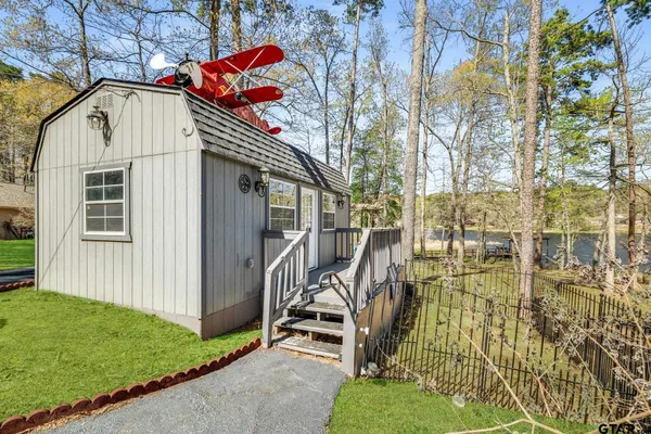 a house view with a garden space