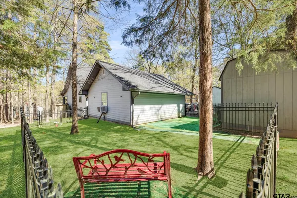 a view of a backyard with a garden
