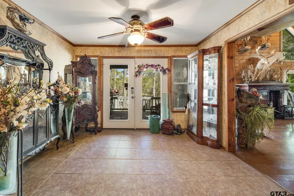 a view of a entryway with a chandelier