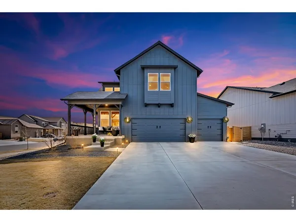a view of a house with swimming pool