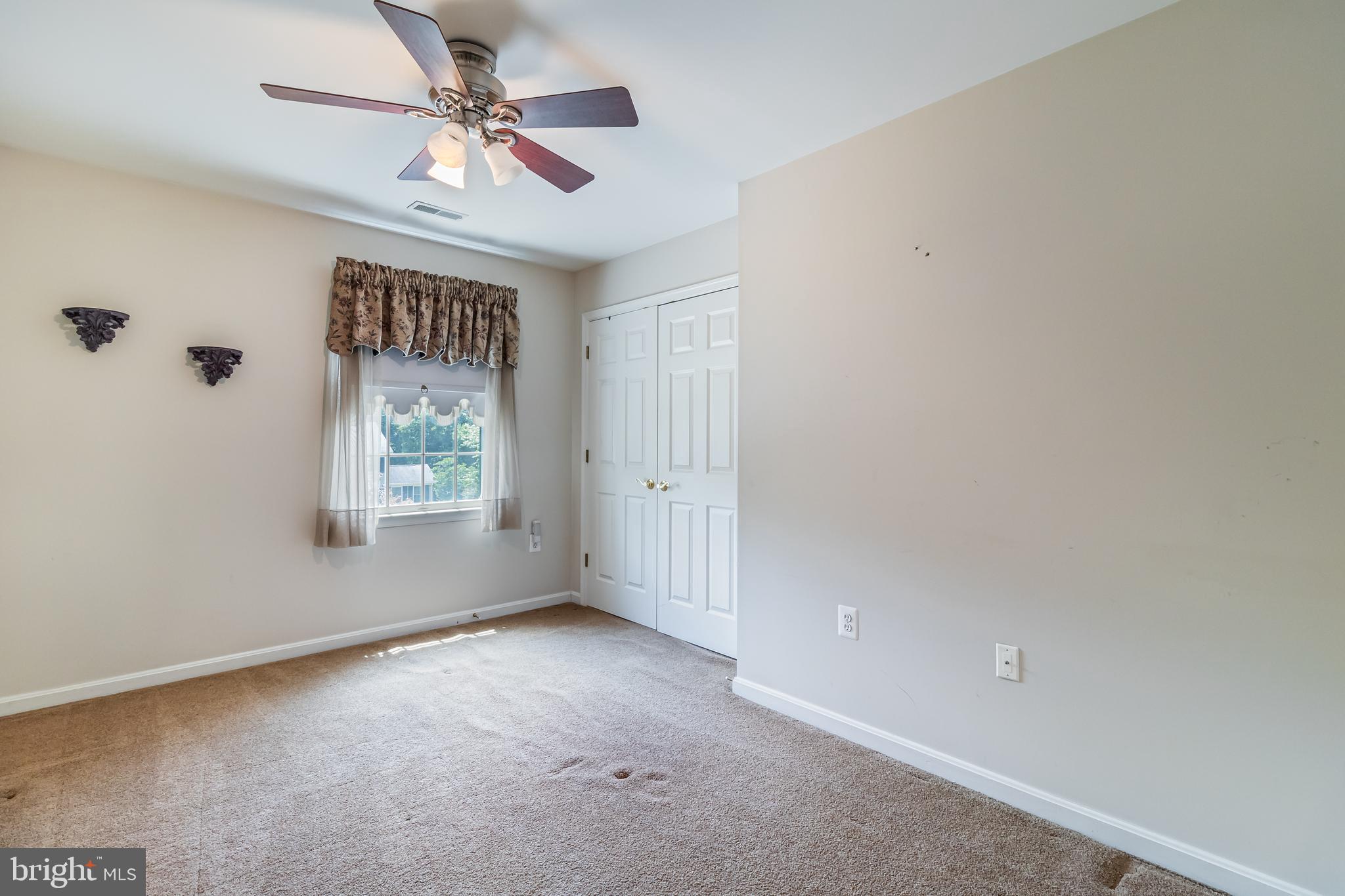 203 Morgans Ridge Court La Plata, MD 20646 - Photo 52 of 59 an empty room with windows and fan