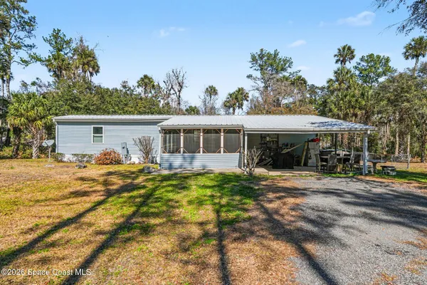 a front view of a house with a porch
