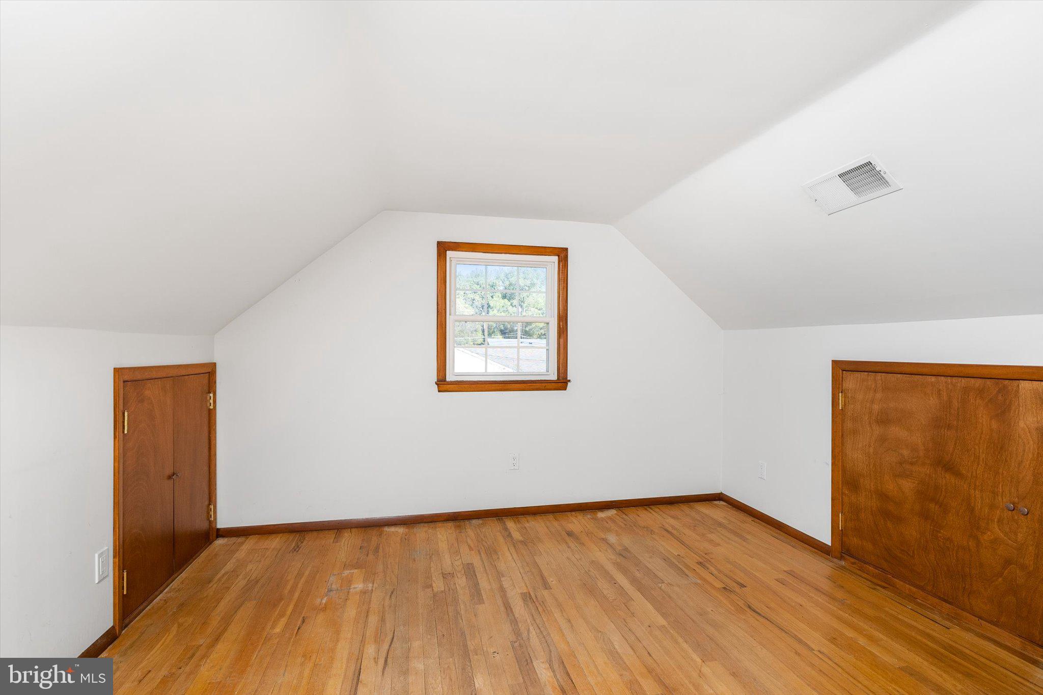 3 Applegate Lane New Egypt, NJ 08533 - Photo 18 of 38 an empty room with wooden floor and windows