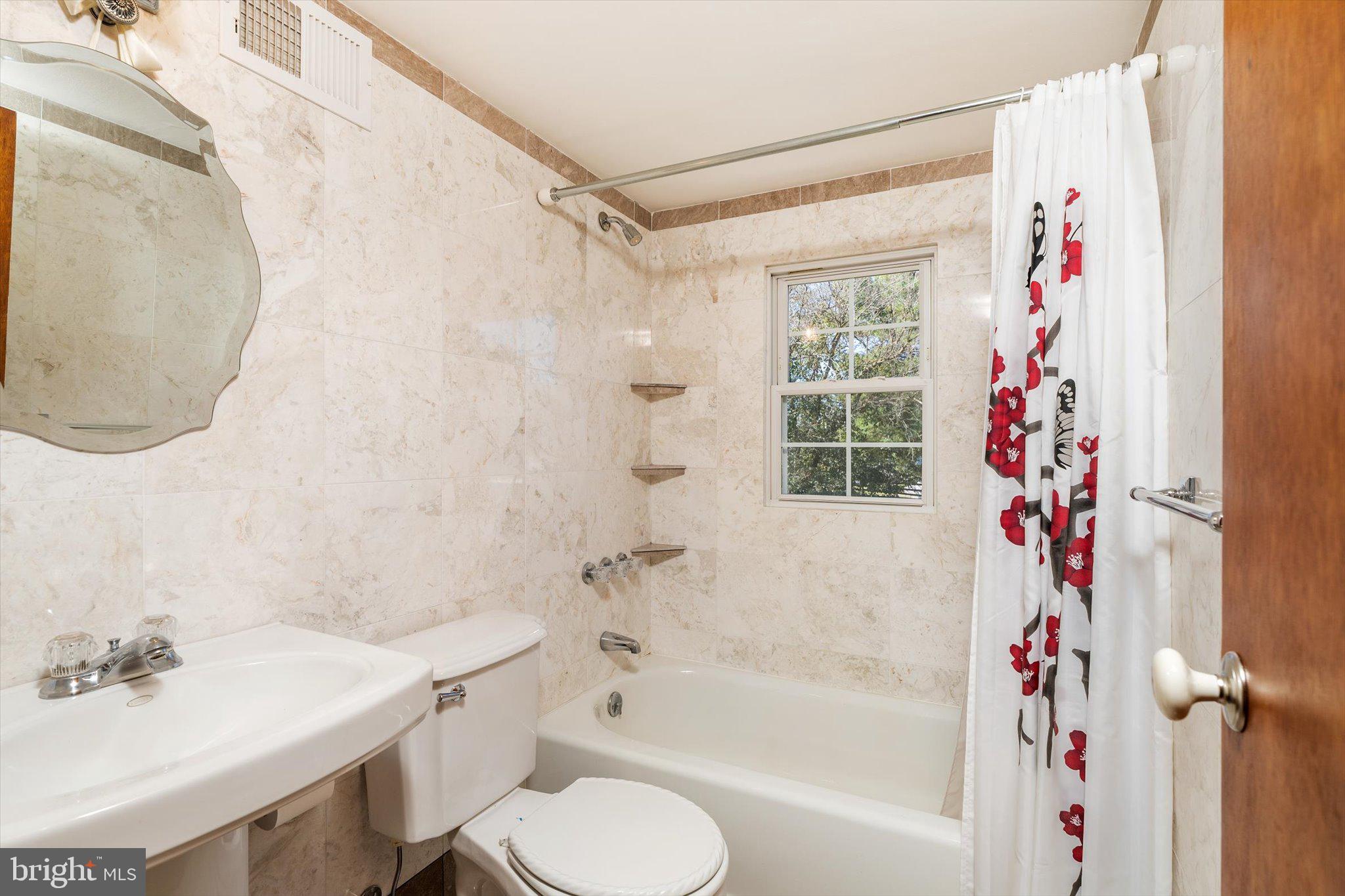 3 Applegate Lane New Egypt, NJ 08533 - Photo 20 of 38 a bathroom with a sink toilet and shower