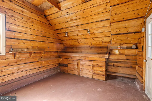 a view of swimming pool with an outdoor space and seating area