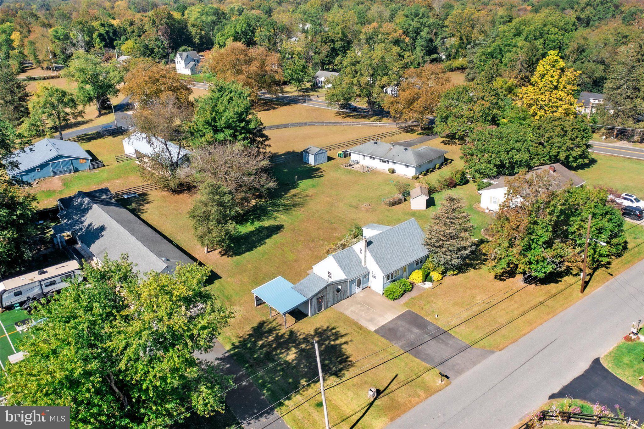 3 Applegate Lane New Egypt, NJ 08533 - Photo 31 of 38 an aerial view of a house with a yard and lake view