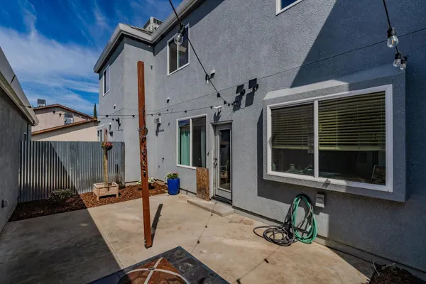 a view of house with chair and tables