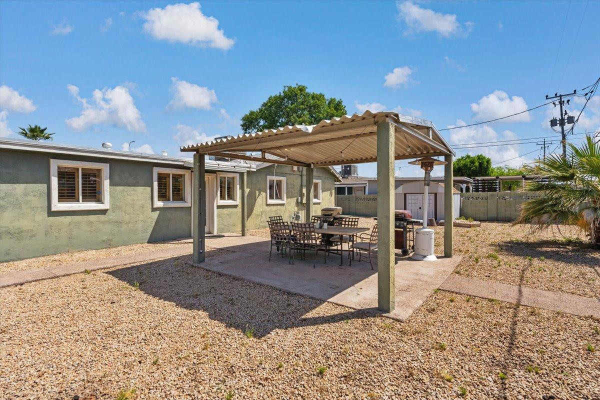 535 West 19th Street Tempe, AZ 85282 - Photo 18 of 20 a view of a house with backyard porch and sitting area