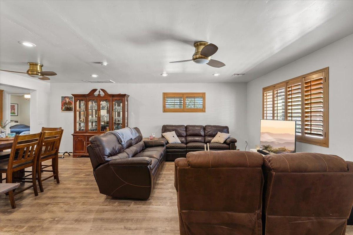 535 West 19th Street Tempe, AZ 85282 - Photo 4 of 20 a living room with furniture ceiling fan and a window