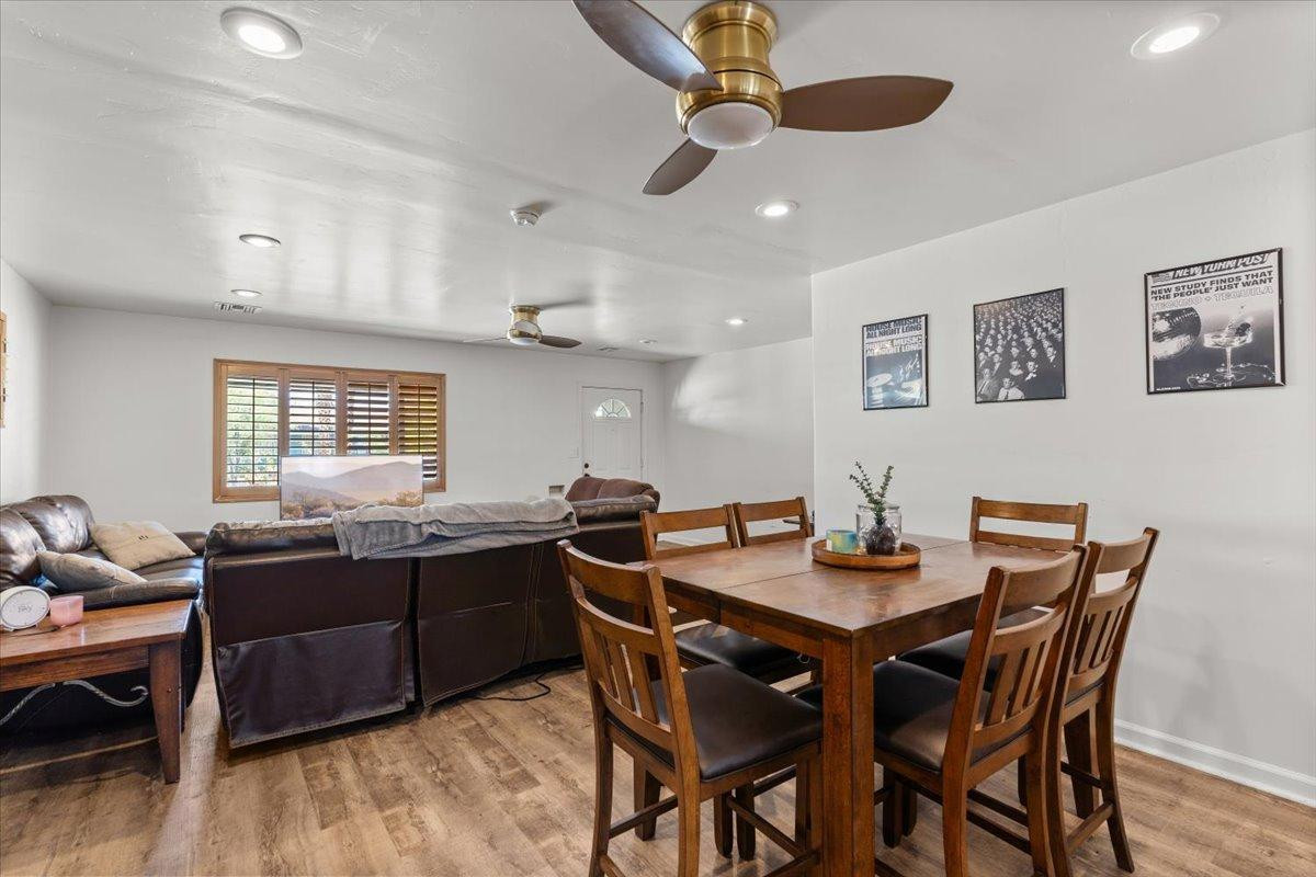 535 West 19th Street Tempe, AZ 85282 - Photo 5 of 20 a view of a dining room with furniture and wooden floor