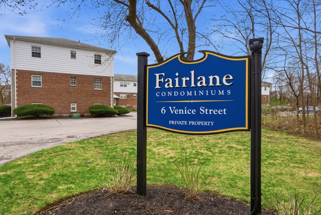 6 Venice Street, Unit B6 Danvers, MA 01923 - Photo 16 of 19 a sign on the side of a building