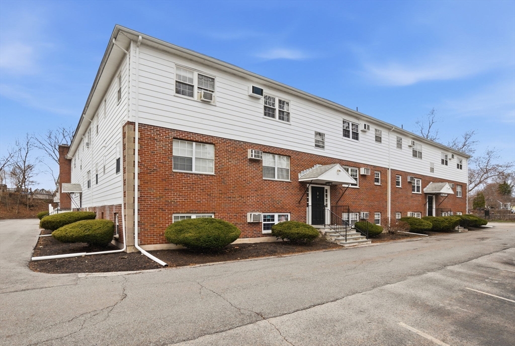 6 Venice Street, Unit B6 Danvers, MA 01923 - Photo 18 of 19 a front view of a building with street
