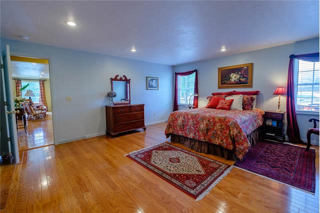 1425 Neelys Bend Road Madison, TN 37115 - Photo 8 of 20 Master Bedroom is off columned hall.