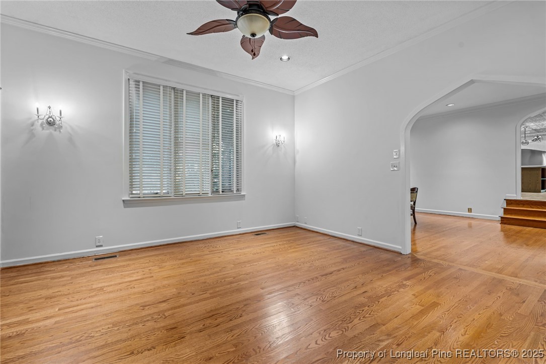 2000 Airport Road Whispering Pines, NC 28327 - Photo 22 of 50 a view of a livingroom with a ceiling fan and window