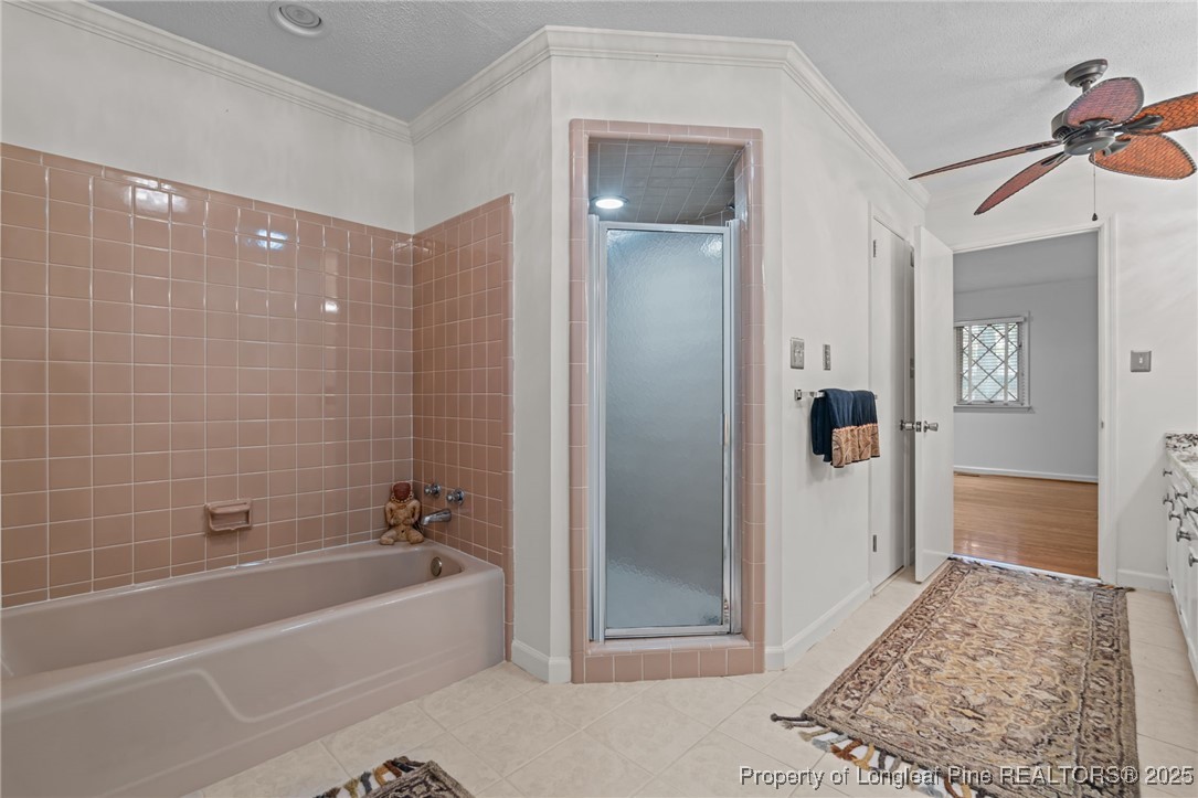 2000 Airport Road Whispering Pines, NC 28327 - Photo 33 of 50 a bathroom with a bathtub and a shower