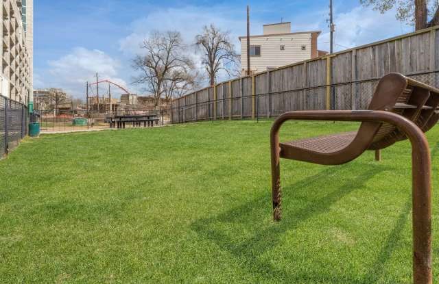 5925 Almeda Road, Unit 12308 Houston, TX 77004 - Photo 45 of 48 a view of a chair and table in the back yard
