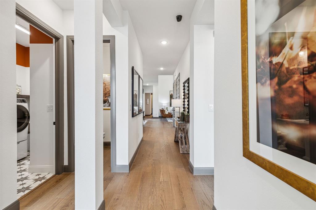 2078 Cuellar Way Van Alstyne, TX 75495 - Photo 4 of 30 a view of a hallway with wooden floor and a living room