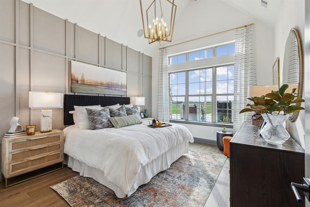 2078 Cuellar Way Van Alstyne, TX 75495 - Photo 9 of 30 a bedroom with a large bed and a window