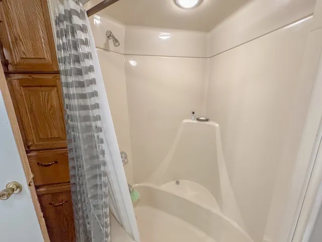 a bathroom with a bathtub