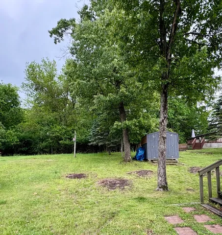 a fire hydrant in the middle of a field