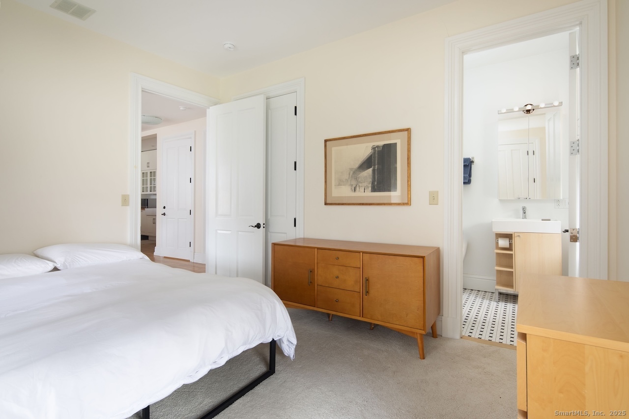 31 Sharon Road, Unit 4 Salisbury, CT 06039 - Photo 7 of 16 a bedroom with a bed and a couch