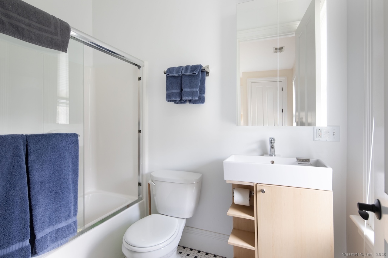 31 Sharon Road, Unit 4 Salisbury, CT 06039 - Photo 8 of 16 a bathroom with a sink toilet and shower