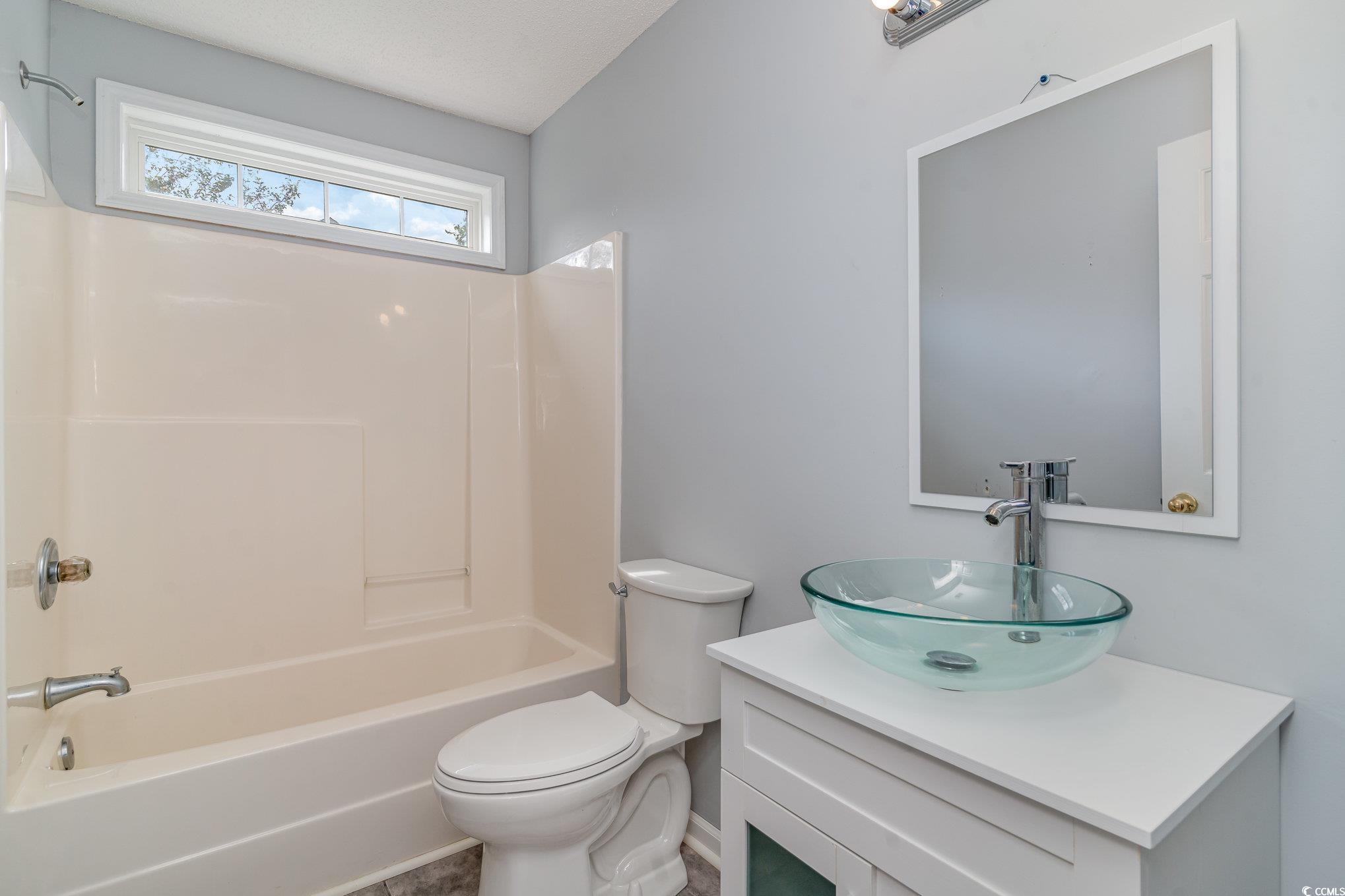 209 Kestrel Court Myrtle Beach, SC 29588 - Photo 15 of 27 Full bathroom featuring bathtub / shower combinati