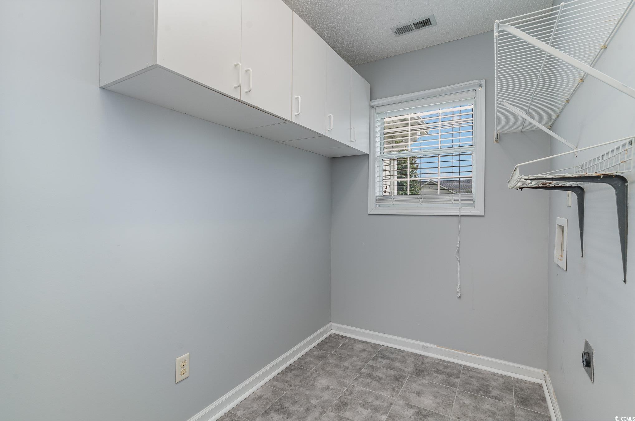 209 Kestrel Court Myrtle Beach, SC 29588 - Photo 19 of 27 Laundry area featuring electric dryer hookup, wash