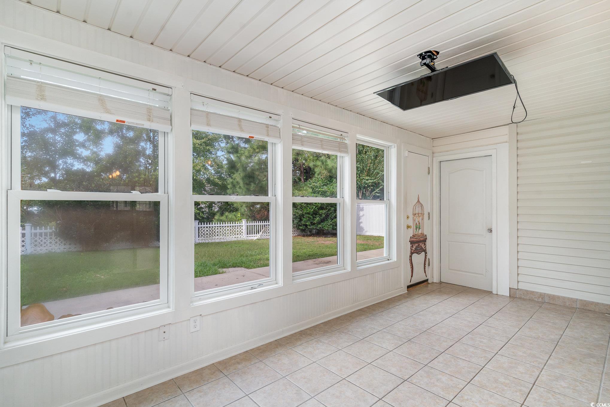 209 Kestrel Court Myrtle Beach, SC 29588 - Photo 3 of 27 View of unfurnished sunroom