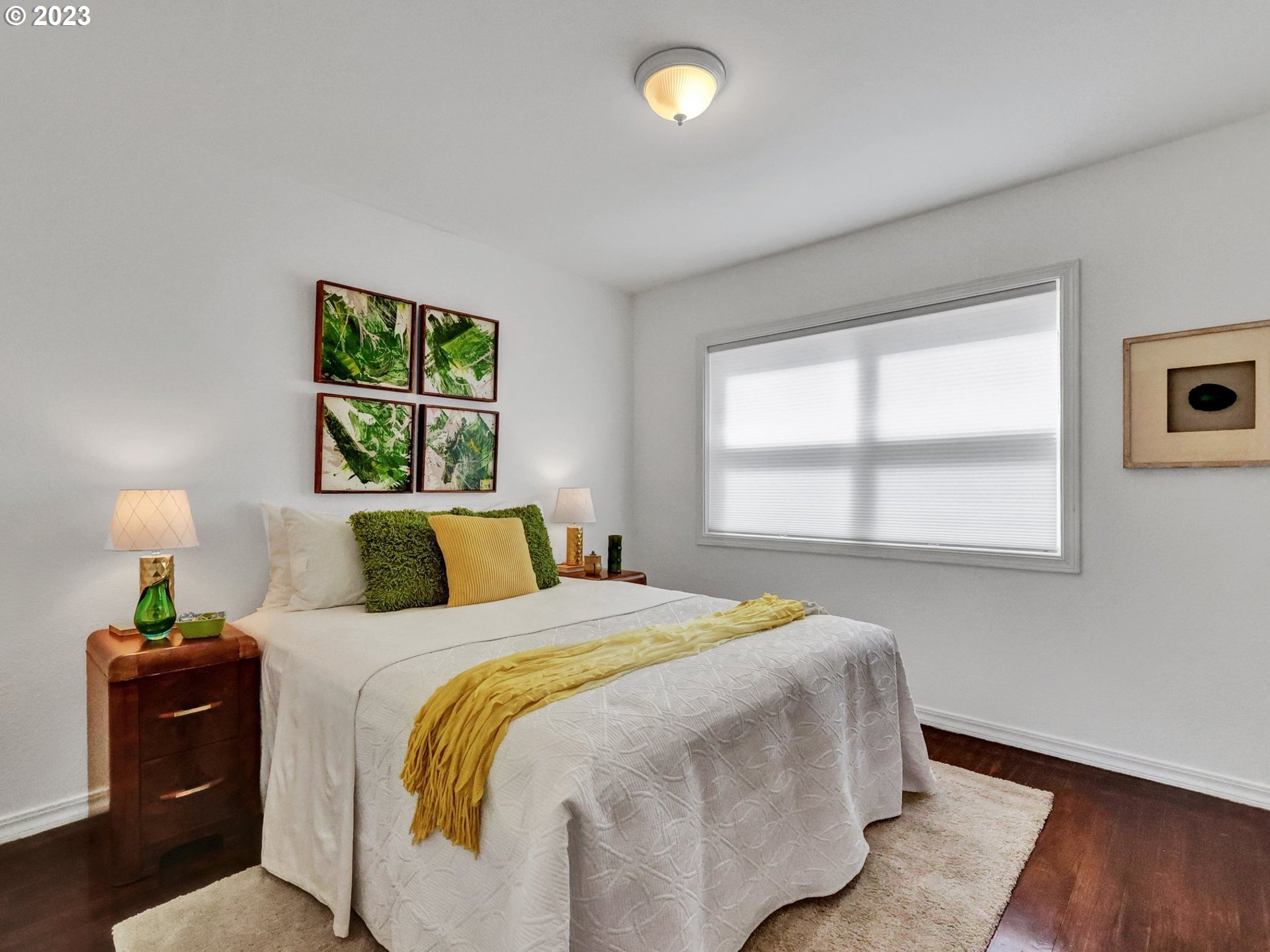 5606 Northeast 27th Avenue Portland, OR 97211 - Photo 16 of 48 a bedroom with a bed and a window