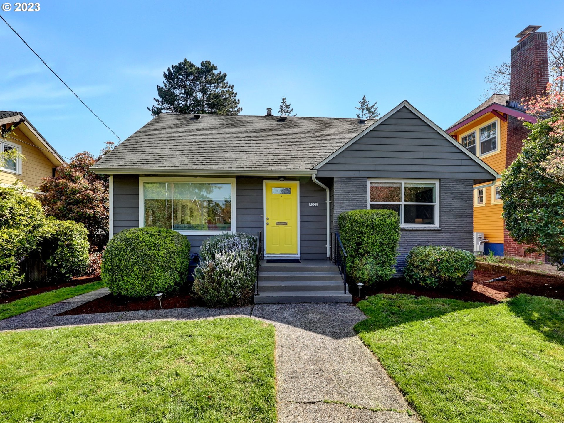 5606 Northeast 27th Avenue Portland, OR 97211 - Photo 2 of 48 a front view of a house with garden